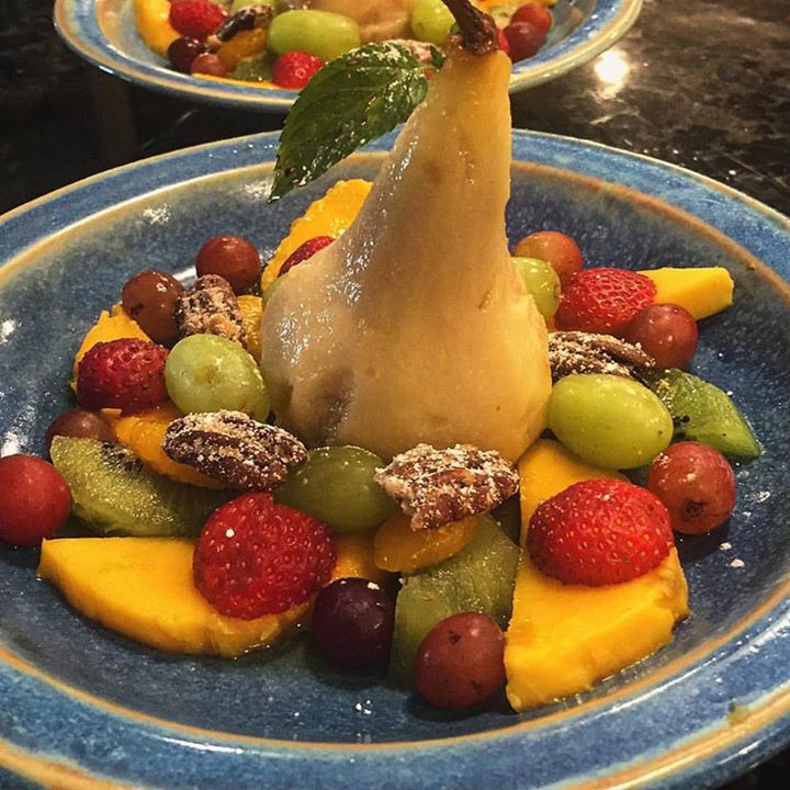 gourmet breakfast poached pear and fruit